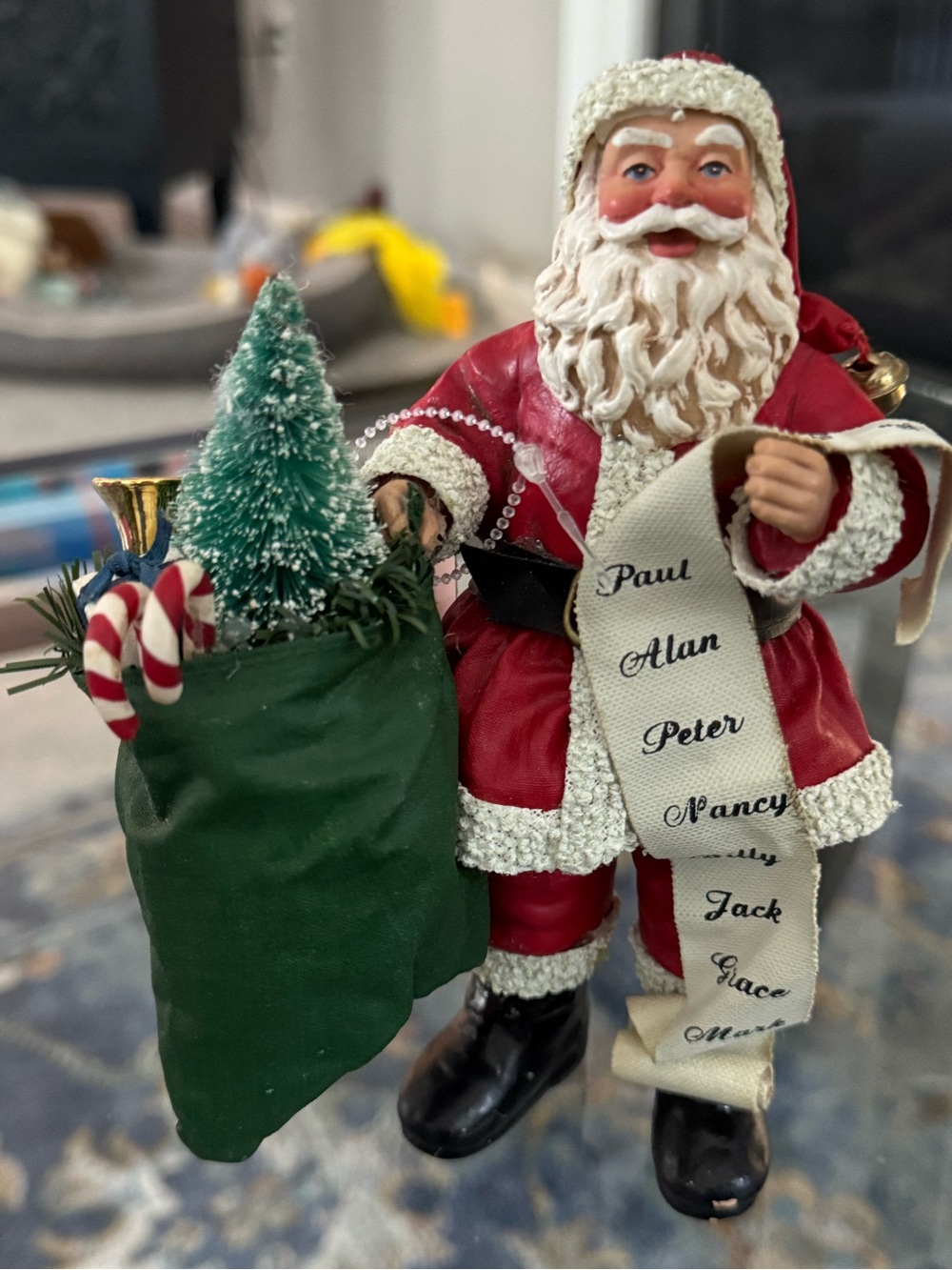 Festive Santa Figurine in Red with Green Sack